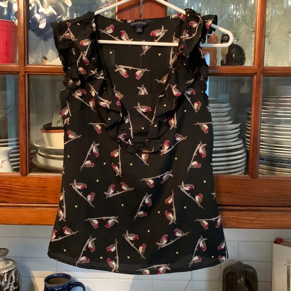 Banana Republic poly bird blouse with‎ ruffle neck. Never worn